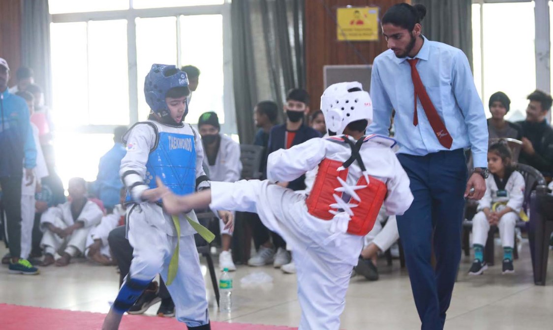 Participants win applaud from the audience for their skills in Taekwondo
