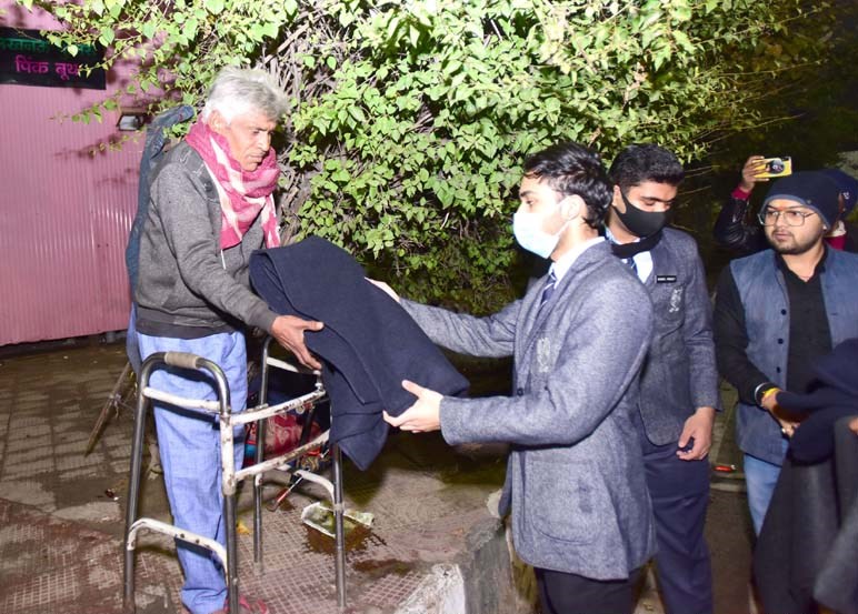CMS students distribute blankets and warm clothes  to the needy as part of their humanitarian work