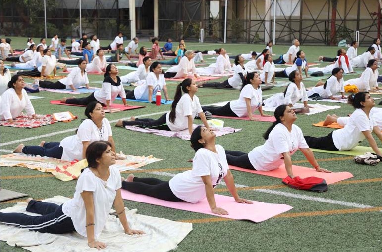 CMS students give a strong message of good health through yoga
