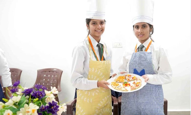 Participating teams skillfully compete to win the quiz, doodles, fashion show and cooking contests