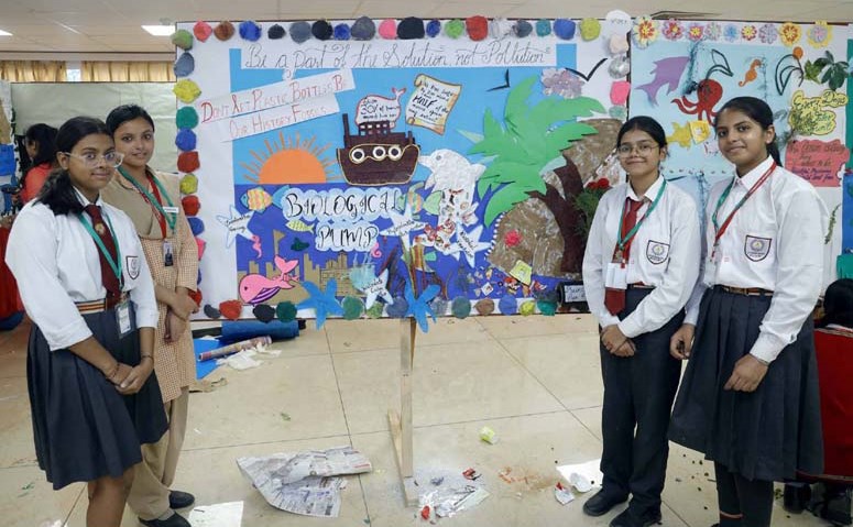 Group Song, Debate, Floor Art and Model Making Contests mark the day s events