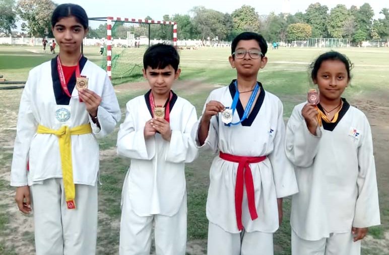 CMS students grab four medals including 2 golds in Taekwondo championship