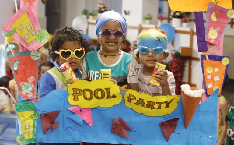 Little ones lit up with joy at the Pool Party