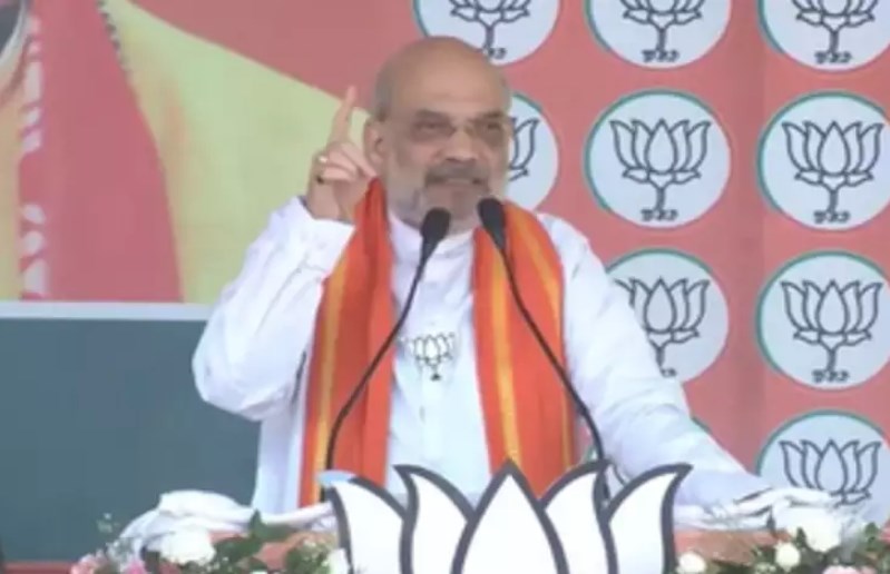 पाक अधिकृत कश्मीर को भारत का अभिन्न अंग बनाकर रहेंगे : अमित शाह