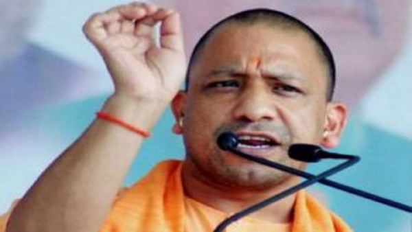 जेल जाते वक्त विधायक विजय मिश्र ने सीएम योगी को हटाने की चुनौती दी है